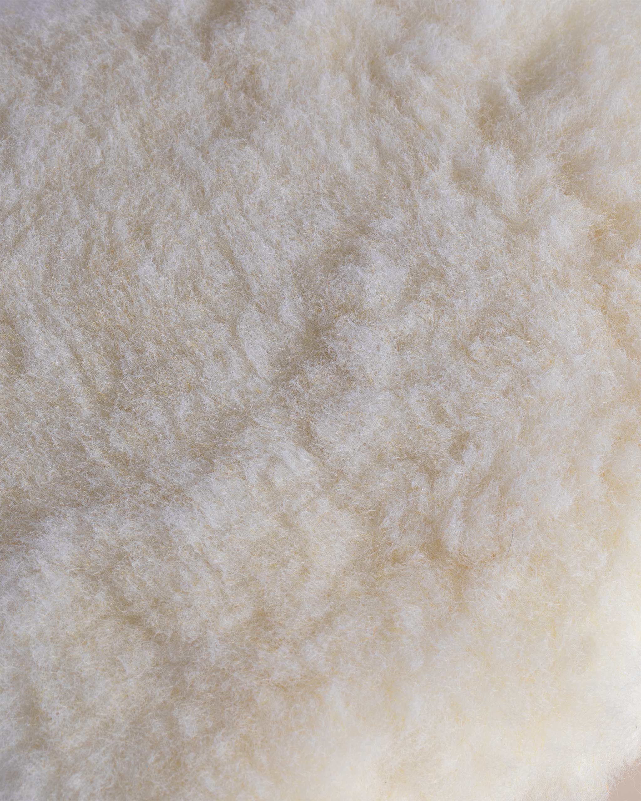 Close-up view of Adam's 10" Car Wash Pad, highlighting its soft, textured synthetic wool fibers ideal for washing vehicles.