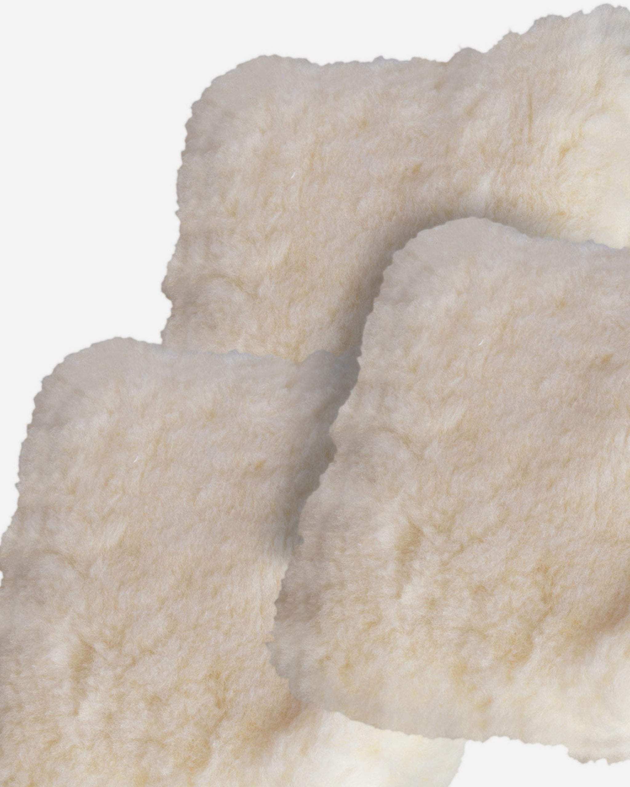 Close-up image of Adam's 10" Car Wash Pad, made of soft, plush synthetic wool material in a cream color, ideal for scratch-free car cleaning.