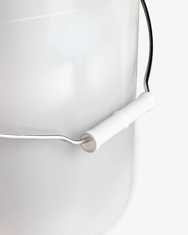 Close-up of the handle and upper part of a white plastic bucket with a metal handle covered in white foam, labeled as "Adam's $149.99 Mystery Bucket".