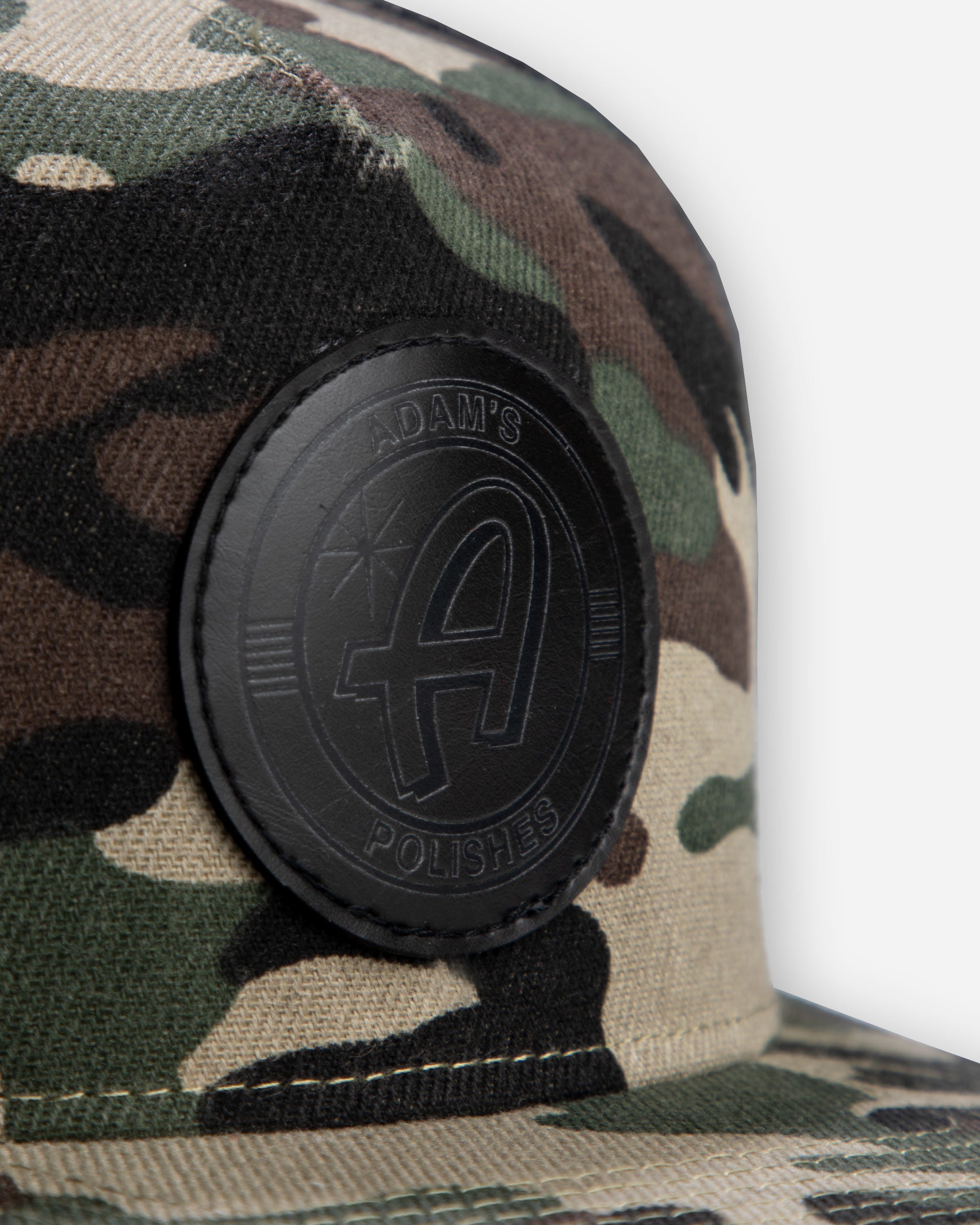 Adam's Camo Trucker Hat - Black Patch