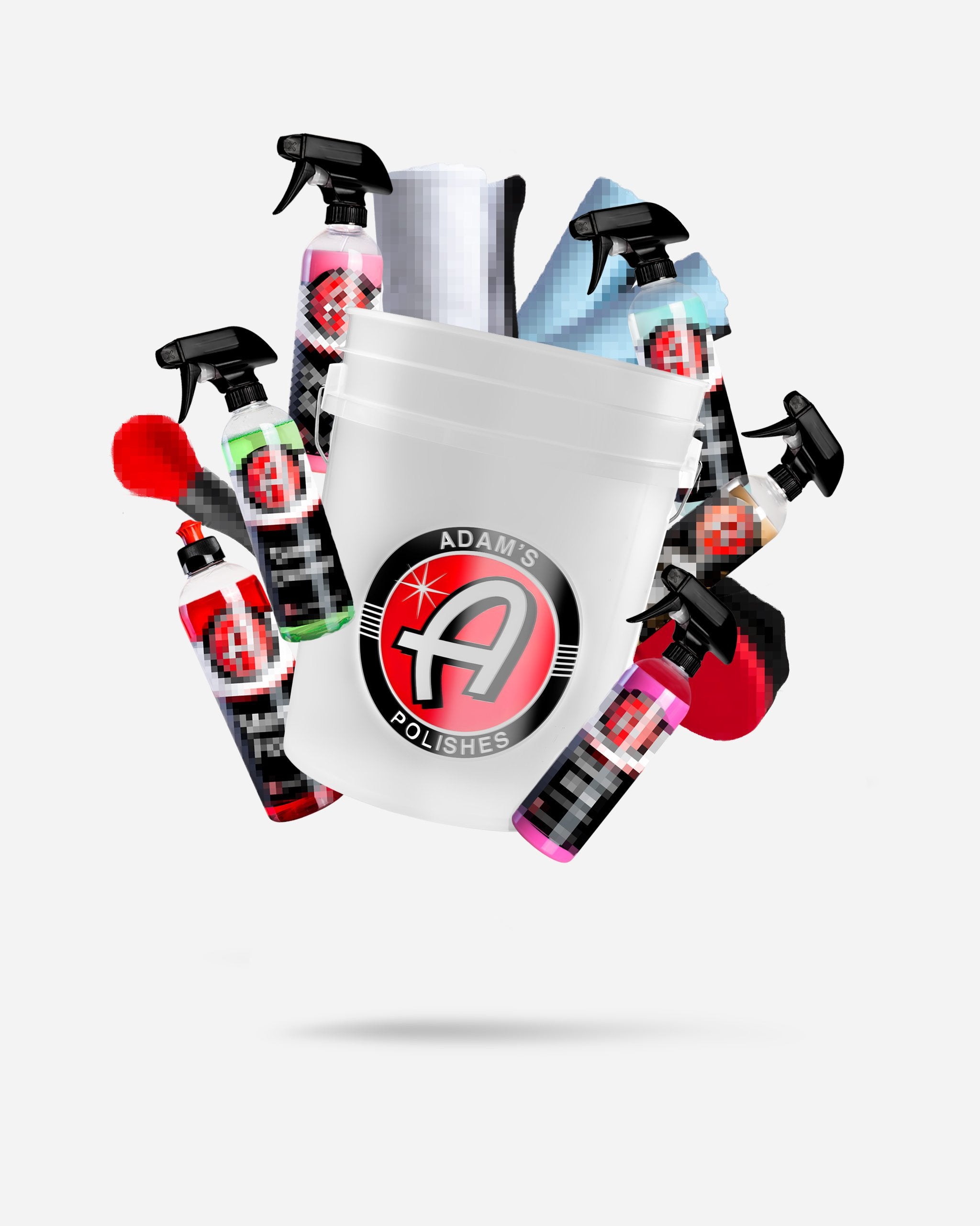 Alt text: "Adam's Polishes Mystery Bucket valued at $69.99, featuring a white bucket with the logo filled with various car care products including spray bottles and towels, hidden with digital pixelation for a mystery effect."