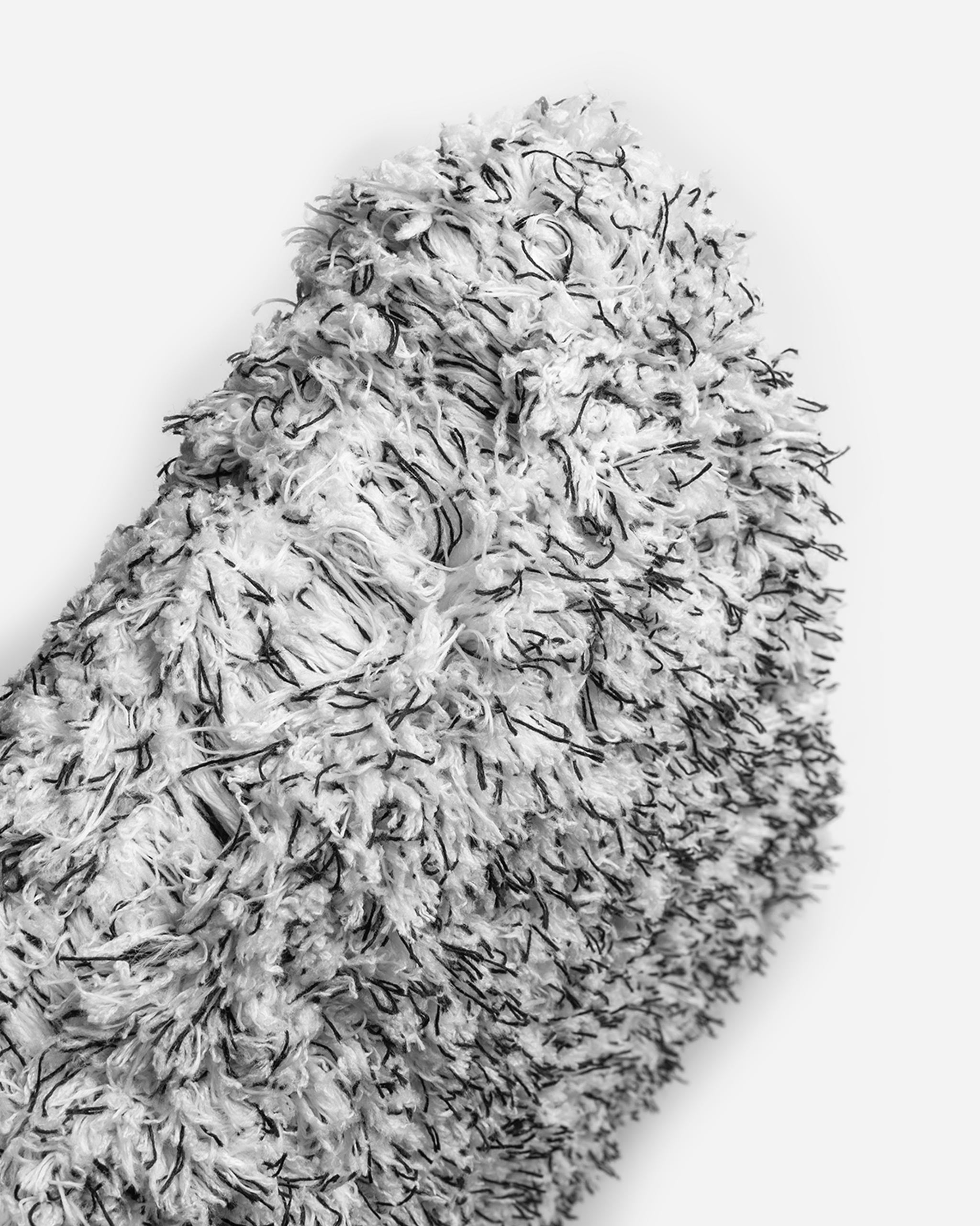 Close-up view of Adam's 10" Microfiber Wash Sponge, featuring dense grey and white fibers for effective and gentle cleaning.